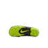 The underside of a Nike soccer cleat with a neon green and black studded sole, set against a black background. A neon green swoosh is centered on the black midfoot section.