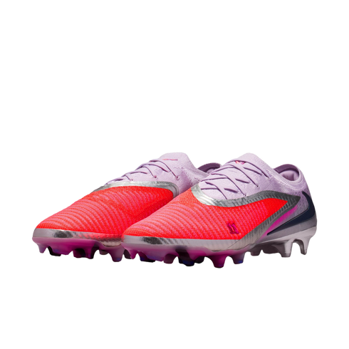 A pair of purple and bright red Nike Phantom GX soccer cleats with metallic silver accents, displayed against a solid black background.