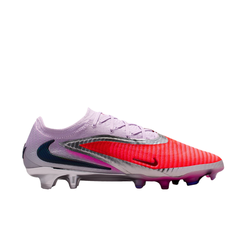 Side profile of a Nike soccer cleat featuring a light purple heel, silver accents, and a bright red forefoot against a black background.