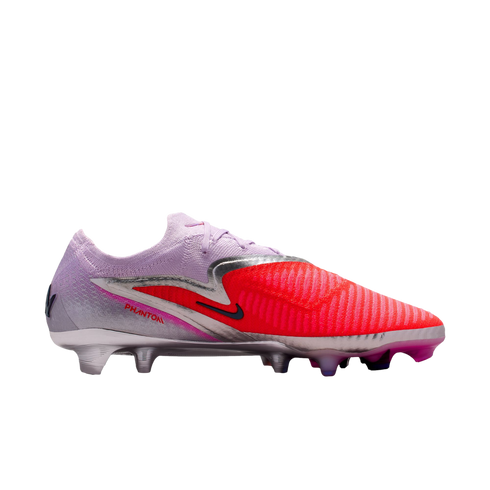 Profile of a Nike Phantom soccer cleat with a light purple heel, vibrant red forefoot, silver metallic accents, and a black swoosh against a solid black background.