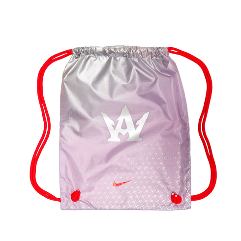 Metallic silver and pink gradient drawstring bag with red cords, featuring a large white crown logo and a small red Nike swoosh.