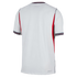 A back view of a white, short-sleeved athletic jersey with red vertical stripes on the sides, navy and red trim on the collar and cuffs, and "AERO-FIT" printed on the bottom right. The jersey is shown against a solid black background.