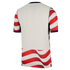 Back view of a white athletic jersey with red and white wavy stripes on the sleeves and bottom hem, finished with navy blue cuffs and collar.