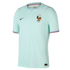 A light mint green Nike France national team soccer jersey with the rooster crest, two stars, and tricolor trim on the sleeve cuffs.