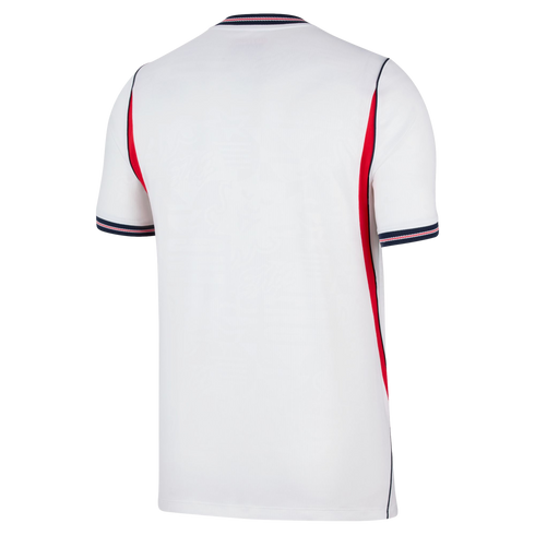 Rear view of a white short-sleeved sports jersey featuring red side panels and navy blue and red striped trim on the collar and sleeve cuffs, set against a solid black background.