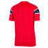 Back view of a red short-sleeved jersey with vertical ribbing. The sleeves feature a navy blue band with a tonal pattern, bordered by thin white stripes.