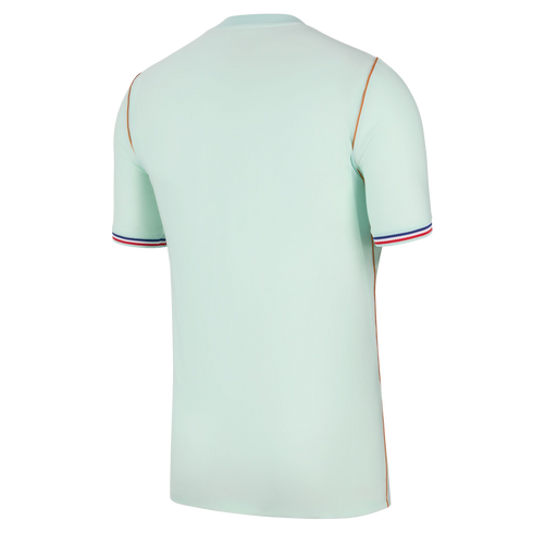Back view of a mint green short-sleeved jersey with orange piping and red, white, and blue striped cuffs, set against a black background.