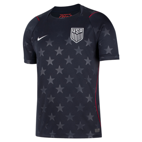 Black Nike USA soccer jersey with an all-over grey star pattern, featuring a central USA crest, white swoosh, and thin red trim.
