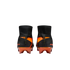 Rear view of black and orange Nike Mercurial soccer cleats with a high-cut knit collar, set against a solid black background.