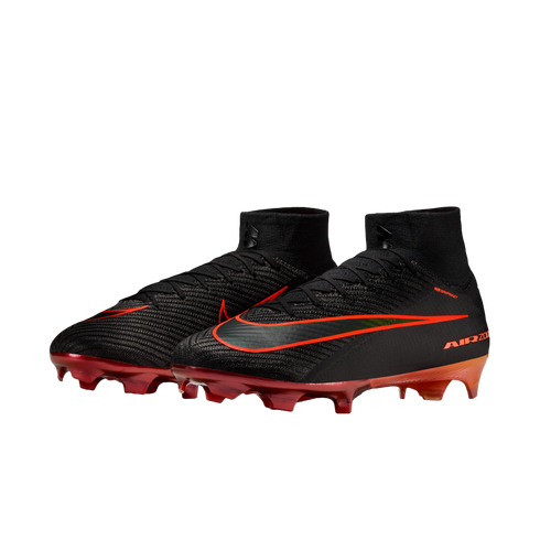 A pair of black Nike Mercurial Air Zoom soccer cleats with bright orange and red accents. The cleats feature a high-top, sock-like collar and a textured upper material. A large, orange Nike Swoosh wraps around the side, and the sole plate and studs are a