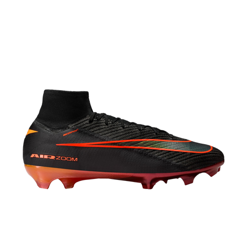 A side profile of a Nike Mercurial Superfly soccer cleat against a solid black background. The boot is primarily black with a high-top knit collar and a large orange-outlined swoosh stretching across the side. The soleplate features a vibrant orange and r