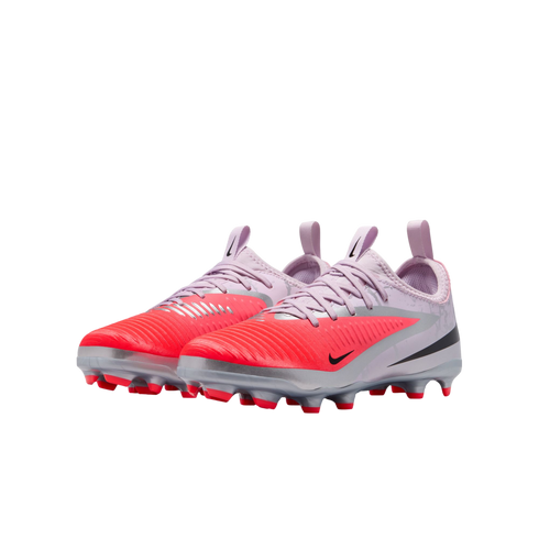 Pair of lavender and bright red Nike soccer cleats with silver accents and black swooshes, displayed against a black background.
