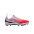 Profile view of a Nike soccer cleat with a lavender heel, silver accents, and a bright red toe and studs, set against a black background.