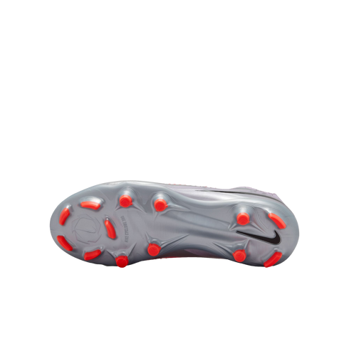 Bottom view of a silver Nike soccer cleat featuring bright orange studs and "NIKE CYCLONE 360" text against a black background.