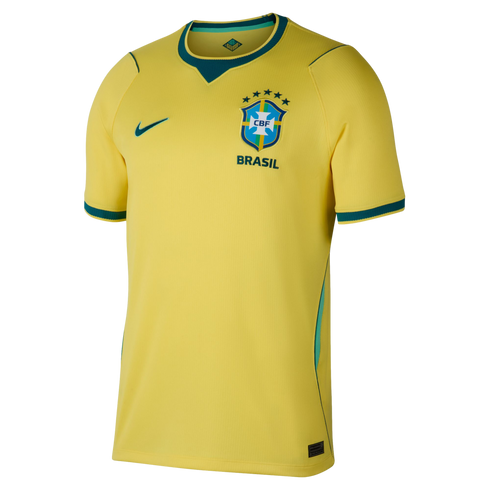 A yellow Nike Brazil national soccer team home jersey with green trim on the collar and cuffs. The shirt features a green Nike swoosh on the right chest and the official CBF crest on the left chest, topped by five stars and the word "BRASIL" below.
