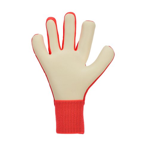 Goalkeeper glove shown from the palm side with cream foam padding and a red ribbed wristband, set against a black background.