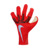 A red Nike goalkeeper glove with black grip textures and a light blue swoosh, displayed against a solid black background.