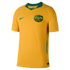 Gold Australia national football team home jersey with green collar, Nike swoosh, and team crest.