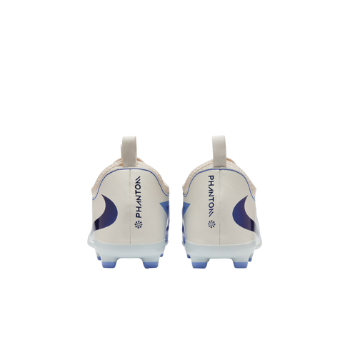 Rear view of white Nike Phantom soccer cleats with blue accents and 'PHANTOM' branding on the heels, against a black background.