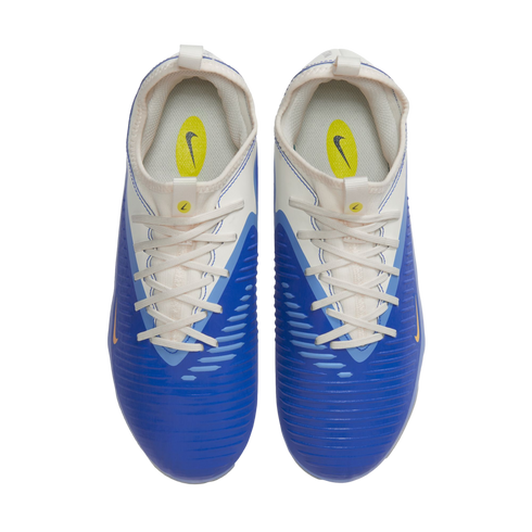 Top-down view of blue and white Nike athletic shoes with white laces on a black background.