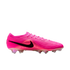 A vibrant pink Nike soccer cleat featuring a black swoosh, wavy textured upper, and iridescent studs on a white background.