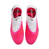 Top-down view of bright pink and white Nike Phantom soccer cleats.