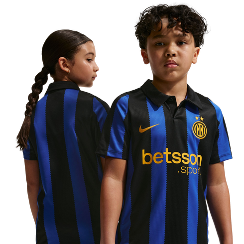 Two children model the black and blue striped Inter Milan home jersey with gold logos, showing both front and back views against a white background.