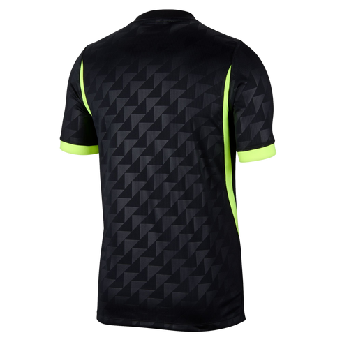 The back view of a black short-sleeved jersey featuring a geometric triangle pattern and neon yellow accents on the sides and sleeve cuffs.