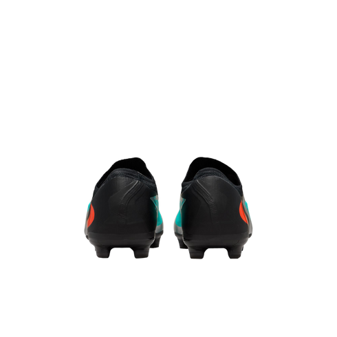 Rear view of black soccer cleats with orange and teal side accents against a solid black background.