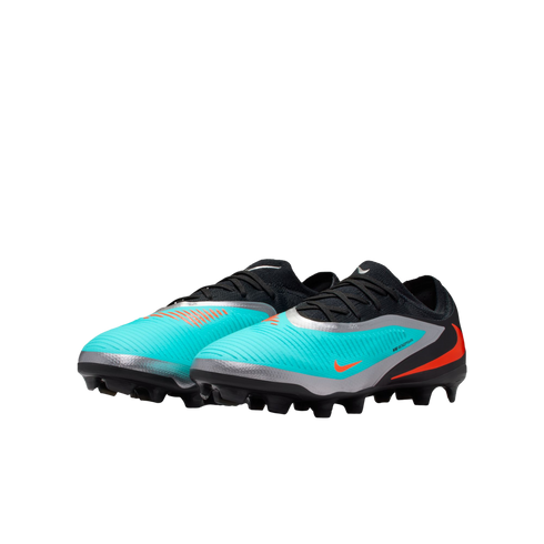 Teal and black Nike Phantom Venom soccer cleats with silver and orange accents, set against a black background.