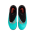Overhead view of teal and black Nike Phantom soccer cleats with orange accents and black laces against a solid black background.