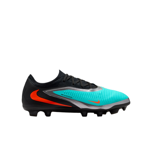Side view of a Nike soccer cleat with a black, silver, and turquoise upper and orange swoosh accents, isolated on a black background.