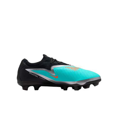 Side profile of a Nike Phantom Flyknit soccer cleat in black, teal, and silver with orange accents, displayed against a solid black background.