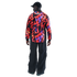 Rear view of a man wearing a black cap, a multi-colored star-patterned shirt with "STATES" on the back, and baggy black pants against a black background.