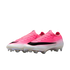 A pair of pink and white Nike soccer cleats with a large black swoosh and iridescent studs on a plain white background.