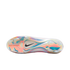 Iridescent, multi-color sole of a Nike soccer cleat with a black swoosh and molded studs. Text on the plate reads "FLYLITE | Lightweight Plate System."