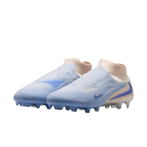 A pair of light blue and pale pink Nike soccer cleats with purple accents, shown at an angle against a black background.