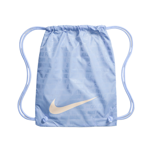 Light blue Nike drawstring bag featuring a cream swoosh and a faint, tonal repeating pattern of Nike logos and sports terms.