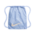 Light blue Nike drawstring bag featuring a cream swoosh and a faint, tonal repeating pattern of Nike logos and sports terms.