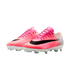 Bright pink and white Nike soccer cleats with large black swooshes and white studded soles, isolated on a white background.