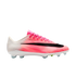 Profile view of a pink and white Nike Flyweave soccer cleat featuring a large black swoosh and clear-tipped studs on a white background.