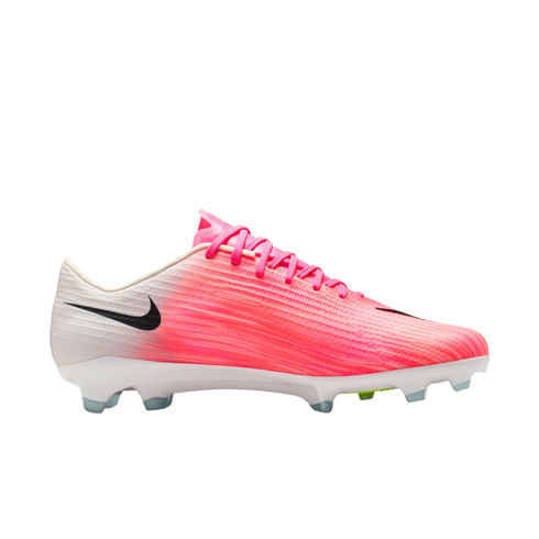 Side-view of a Nike soccer cleat with a pink-to-white gradient upper, black swoosh, pink laces, and white soleplate with clear-tipped studs on a plain white background.