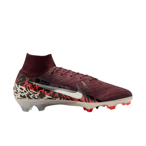 A side profile of a Nike Mercurial soccer cleat against a solid black background. The shoe features a textured burgundy knit upper with a high-top collar, a large metallic silver swoosh, and a heel wrapped in a bold black, red, and cream camouflage-like p