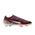 A side-profile studio shot of a Nike Mercurial soccer cleat against a solid black background. The shoe features a deep maroon ribbed upper and a large white Nike swoosh. The lower half of the boot is adorned with a bold graphic pattern in orange, black, a