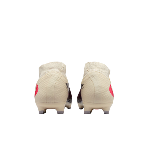 Rear view of two off-white football boots with pink accents and high-top sock collars, shown against a solid black background.