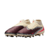 Nike United soccer cleats with maroon and cream uppers, black and white safari print accents, and pink Nike swooshes.