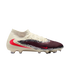 A side view of a Nike United soccer cleat featuring cream, maroon, and safari print panels with a large red swoosh, high-top collar, and "NIKE UNITED 003" text.