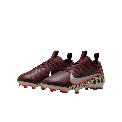 A three-quarter view of a pair of burgundy Nike soccer cleats with a silver swoosh and leopard-print heel details, set against a black background. The cleats have cream soles with bright red studs.