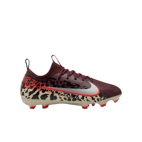 A side profile view of a Nike soccer cleat featuring a maroon upper, a silver metallic swoosh with a red outline, and a black and cream animal print pattern on the lower section, set against a solid black background.