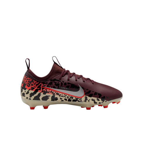 A side-profile view of a Nike soccer cleat against a solid black background. The shoe features a maroon upper with matching laces and a lower section decorated with a tan and black leopard print that transitions into red at the heel. A large silver Nike s